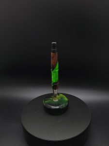 This image portrays Twisted Series-Cosmic Green Hybrid-XL Dynavap Stem by Dovetail Woodwork.