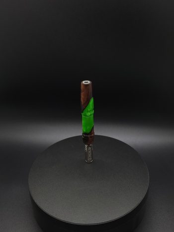 This image portrays Twisted Series-Cosmic Green Hybrid-XL Dynavap Stem by Dovetail Woodwork.