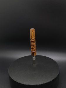 This image portrays Twisted Stems Series-2-Tone Bocote Wood-XL Dynavap Stem by Dovetail Woodwork.