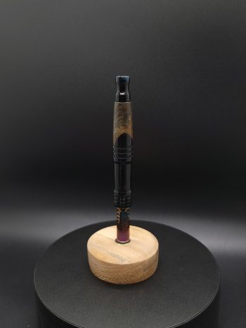 This image portrays High Class Series-Buckeye Burl/Anodized Titanium Core-XL Dynavap Stem by Dovetail Woodwork.