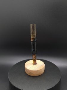 This image portrays High Class Series-Buckeye Burl/Anodized Titanium Core-XL Dynavap Stem by Dovetail Woodwork.