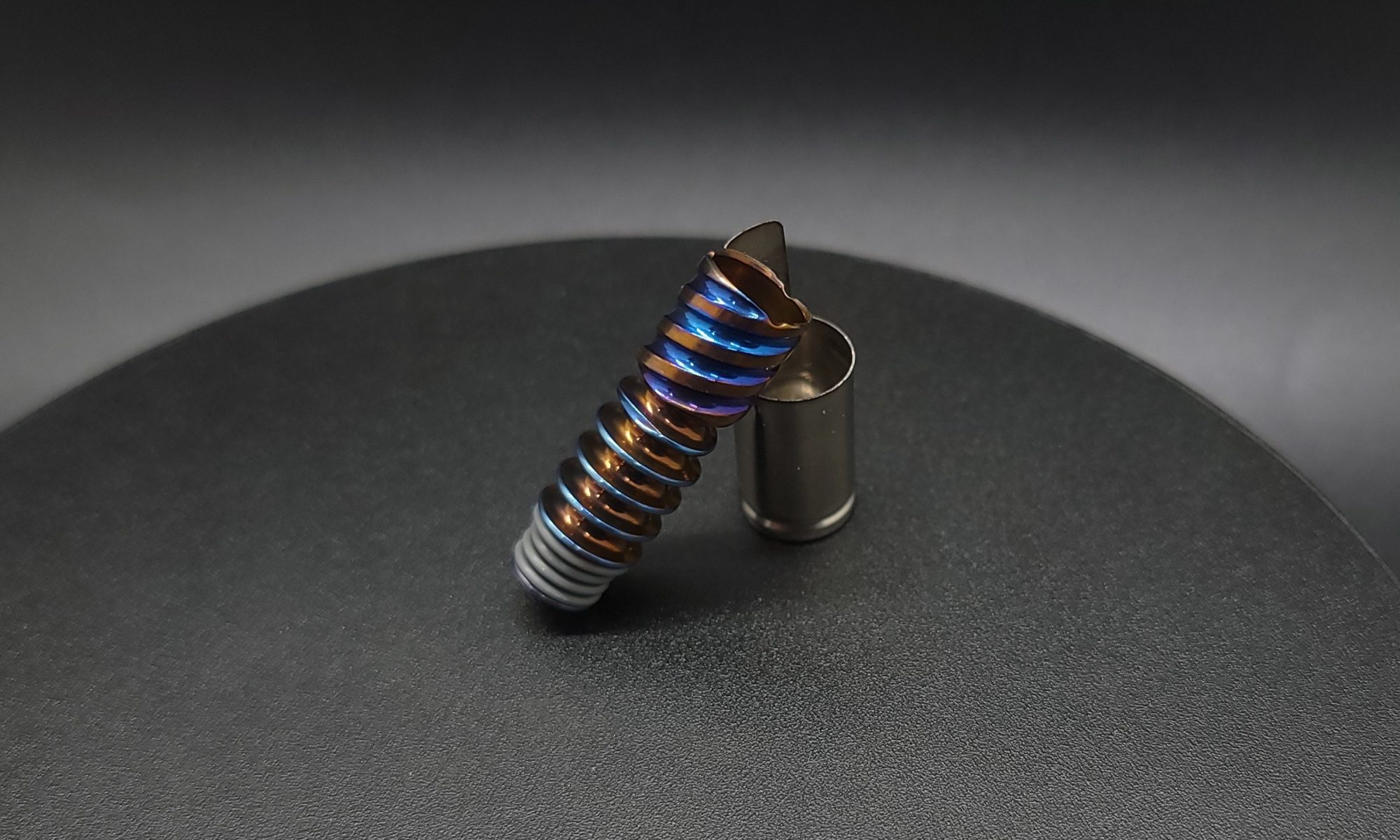 This image portrays Dynavap Omni Tip(OG)-Two Tone Anodized by Dovetail Woodwork.