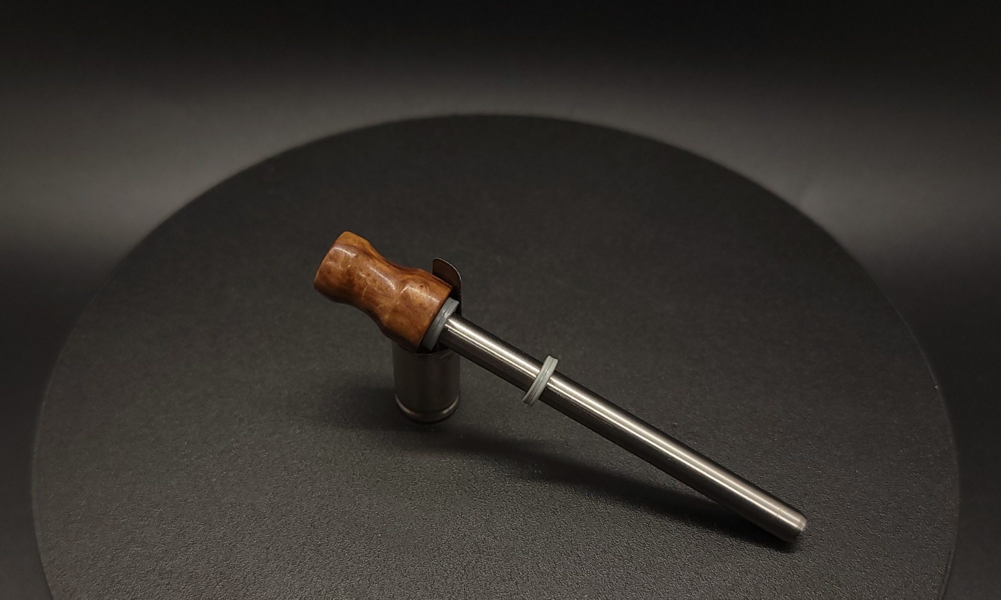 This image portrays Dynavap Spinning Mouthpiece-Australian Graybox Burl by Dovetail Woodwork.