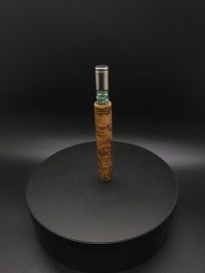 This image portrays Green Cosmic Burl XL-Titanium Core-Dynavap Stem by Dovetail Woodwork.