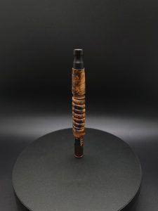 This image portrays Twisted Stems Series-Maple Burl-XL Dynavap Stem by Dovetail Woodwork.