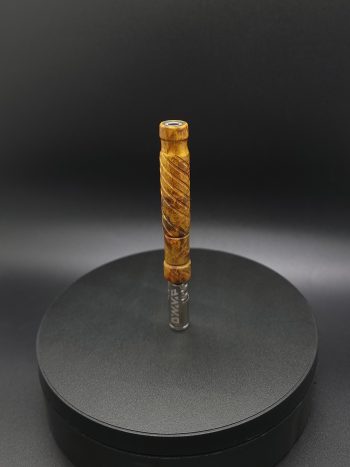 This image portrays Straight Cut XL-Maple Burl/Gold Anodized Titanium-Dynavap Stem by Dovetail Woodwork.