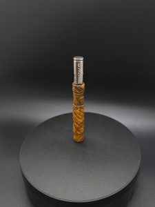 This image portrays Straight Cut XL-Maple Burl/Gold Anodized Titanium-Dynavap Stem by Dovetail Woodwork.