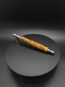 This image portrays Straight Cut XL-Maple Burl/Gold Anodized Titanium-Dynavap Stem by Dovetail Woodwork.