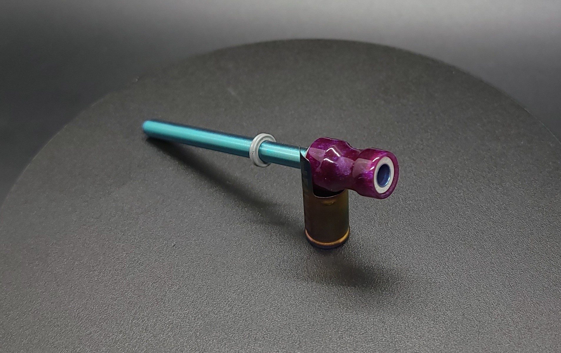 This image portrays Dynavap Spinning Mouthpiece-Galactic Purple by Dovetail Woodwork.