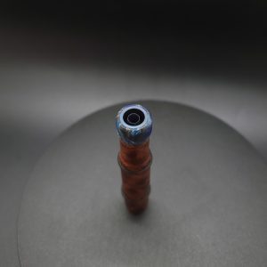 This image portrays Adaptable Stem XL-Redwood Burl Hybrid/Blue Anodized Titanium-Dynavap Stem by Dovetail Woodwork.
