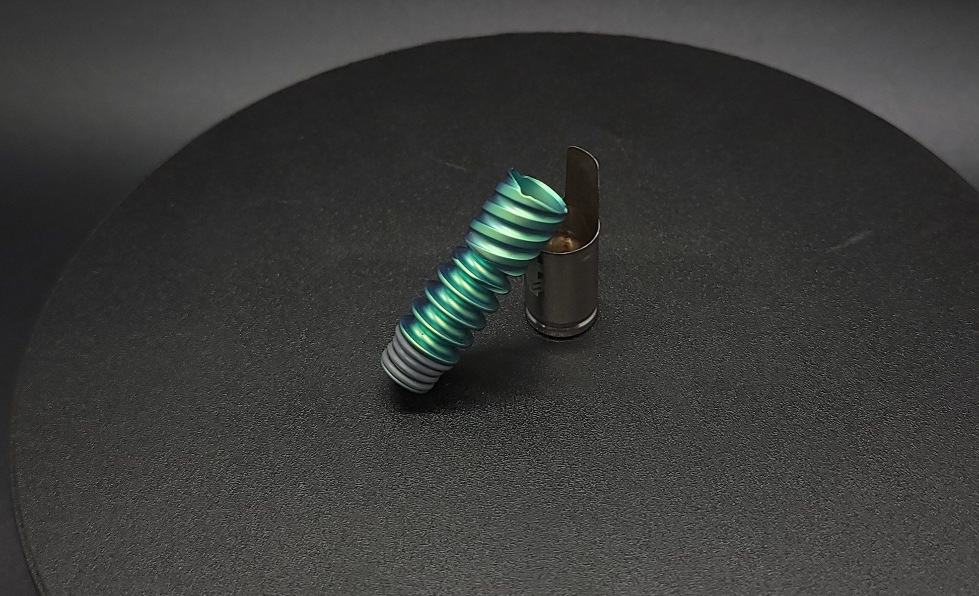 This image portrays Dynavap Omni Tip(OG)-Green Anodized by Dovetail Woodwork.
