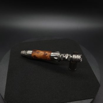 This image portrays Vong(i) Custom Sleeve-Thuya Burl Sleeve by Dovetail Woodwork.