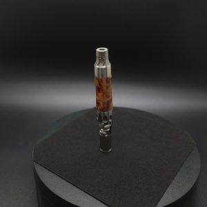 This image portrays Vong(i) Custom Sleeve-Thuya Burl Sleeve by Dovetail Woodwork.