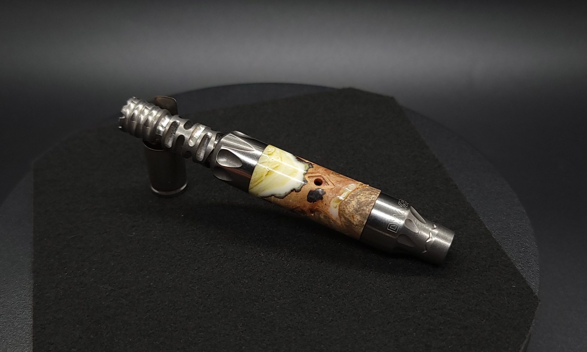 This image portrays Vong(i) Custom Sleeve-Madrone Burl Hybrid by Dovetail Woodwork.