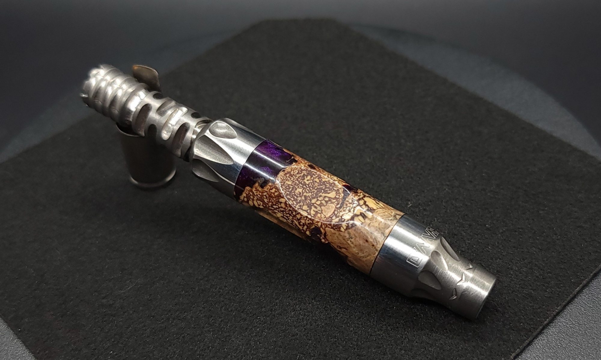 This image portrays Vong(i) Custom Sleeve-Black Walnut Burl Hybrid by Dovetail Woodwork.