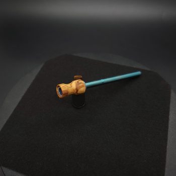 This image portrays Dynavap Spinning Mouthpiece-Olive Wood Burl by Dovetail Woodwork.