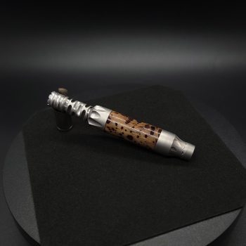 This image portrays Vong(i) Custom Sleeve-Wormy Black Walnut Burl Hybrid-Galactic Purple by Dovetail Woodwork.