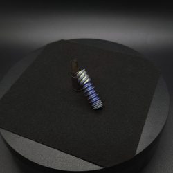 This image portrays Dynavap Omni Tip(OG)-Color Shift Pearlescent Anodized by Dovetail Woodwork.