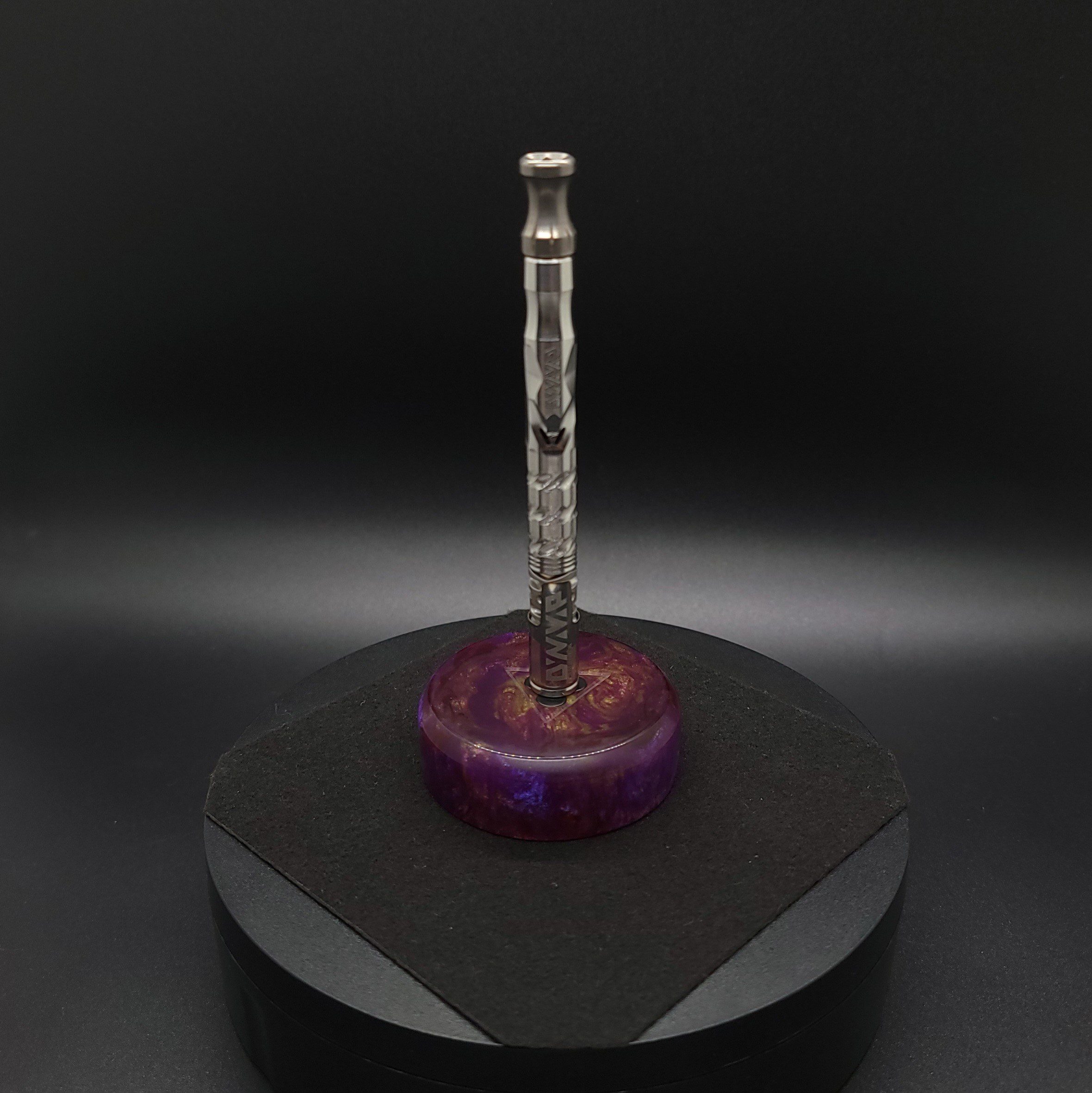 This image portrays DynaPuck-Luminescent Rosium-Dynavap Stem Display by Dovetail Woodwork.