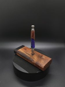 This image portrays 2G-XL Stash-Live Edge Black Walnut Burl/Ebony Wood-Dynavap Case by Dovetail Woodwork.