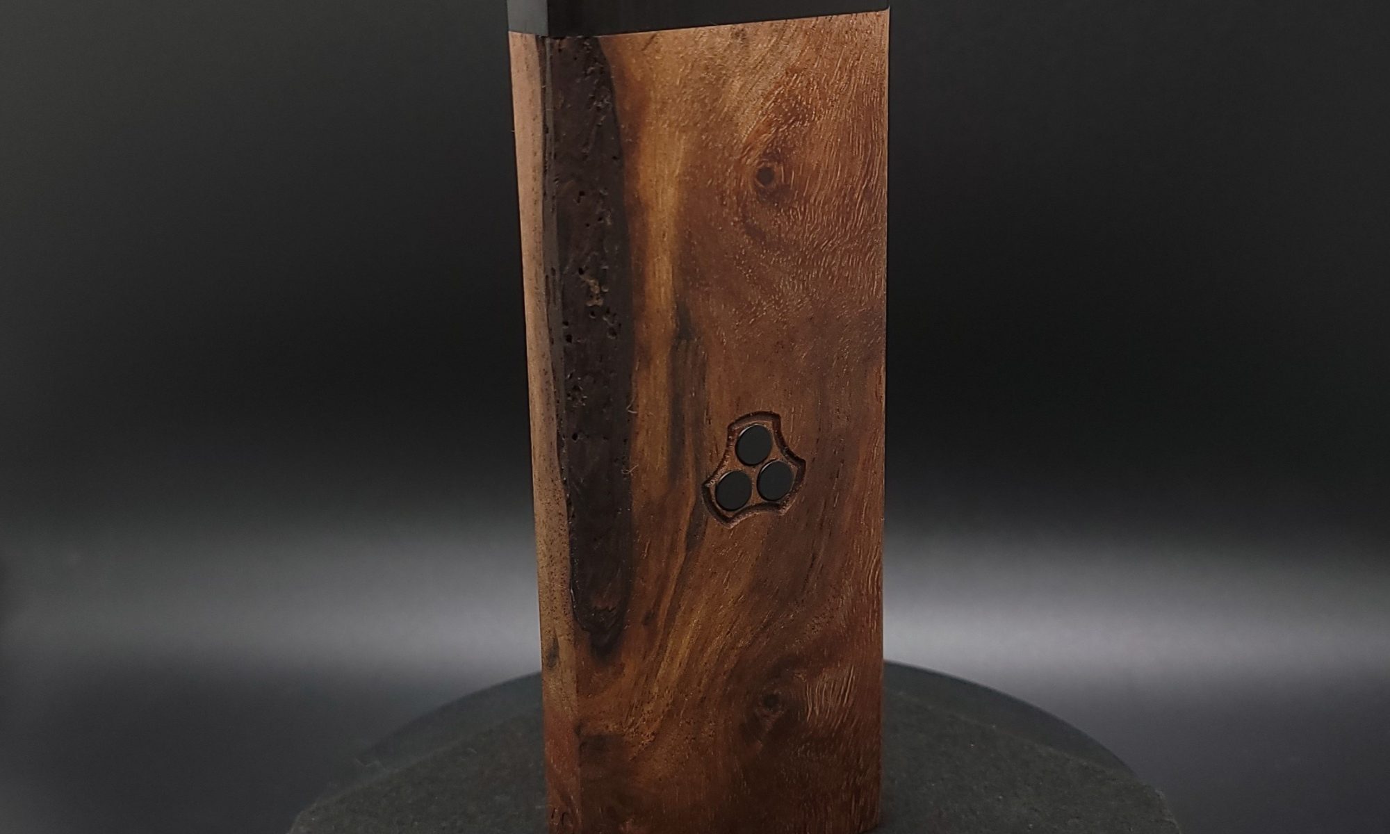 This image portrays 2G-XL Stash-Live Edge Black Walnut Burl/Ebony Wood-Dynavap Case by Dovetail Woodwork.