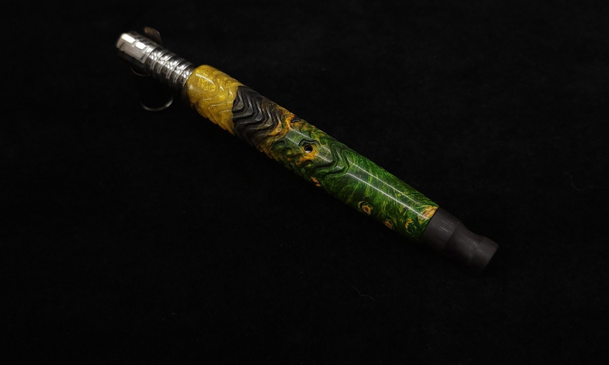 This image portrays Twisted Stems Series-Skeleton XL Dynavap Stem with Ebony Mouthpiece by Dovetail Woodwork.