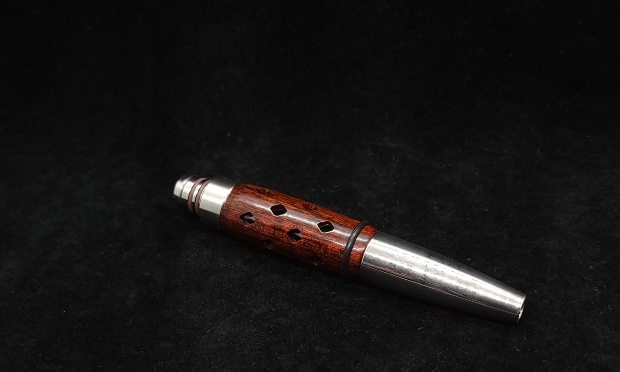 This image portrays Anvil Vestratto Heat Shield Upgrade-Snakewood by Dovetail Woodwork.