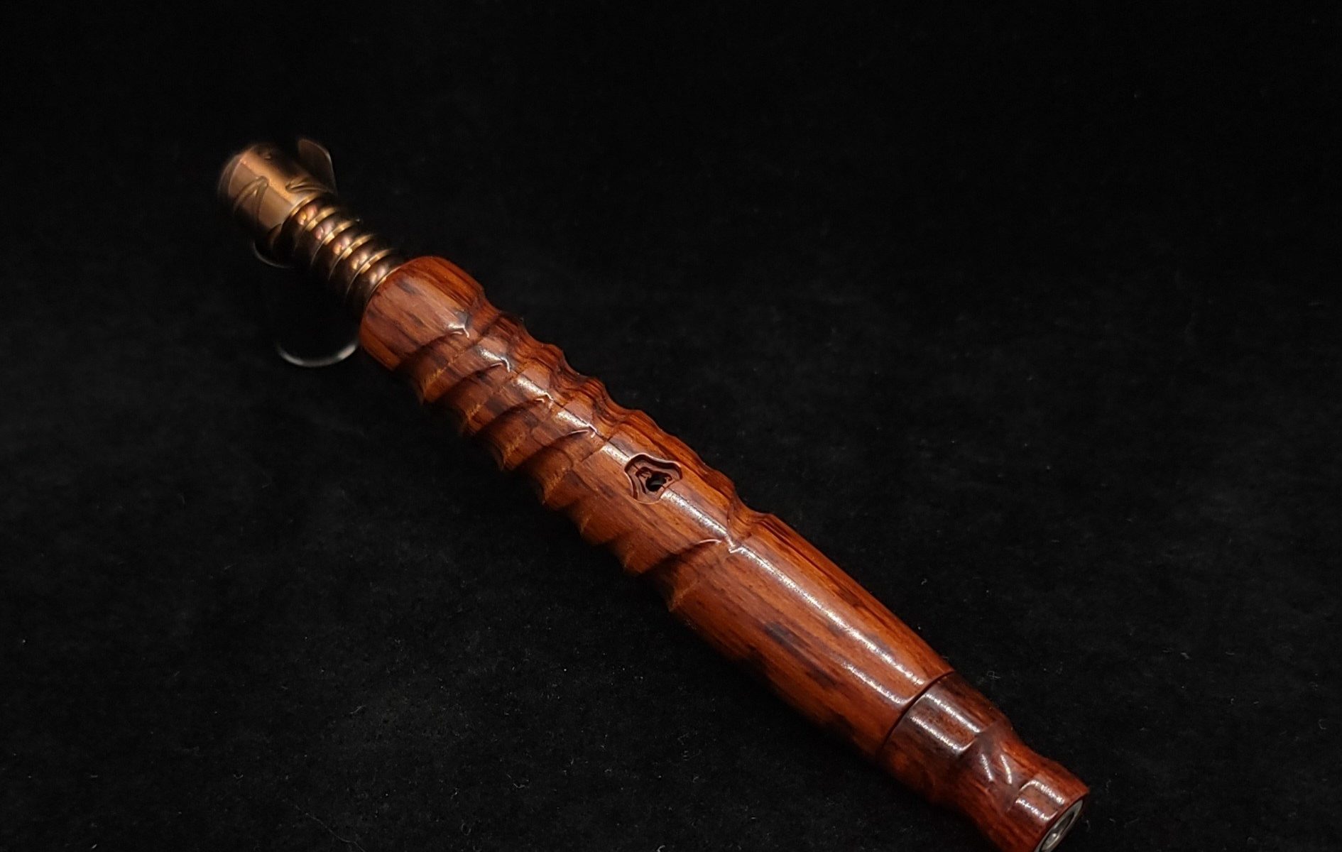 This image portrays Twisted Stems Series-Eclipse XL Dynavap Stem/Snakewood with Matching Mouthpiece by Dovetail Woodwork.
