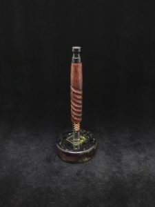 This image portrays Twisted Stems Series-Eclipse XL Dynavap Stem/Banksia Pod Hybrid w/Black Resin M.P. by Dovetail Woodwork.
