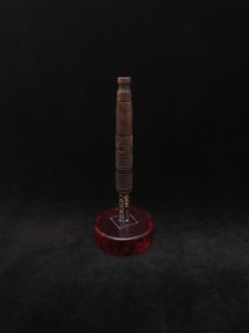 This image portrays High Class-Knurled XL Dynavap Stem/Claro Walnut Burl with Matching Mouthpiece by Dovetail Woodwork.