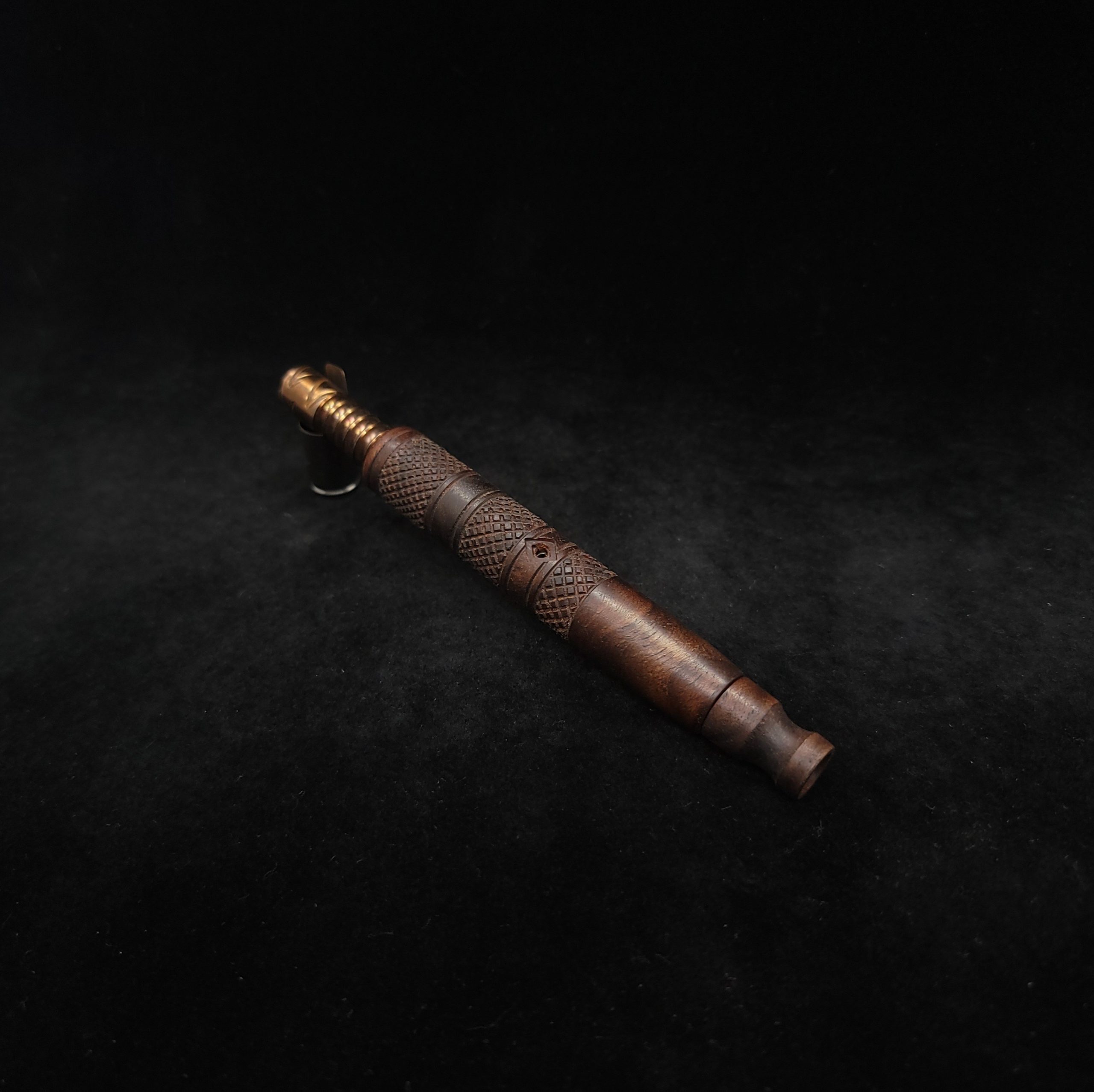 This image portrays High Class-Knurled XL Dynavap Stem/Claro Walnut Burl with Matching Mouthpiece by Dovetail Woodwork.