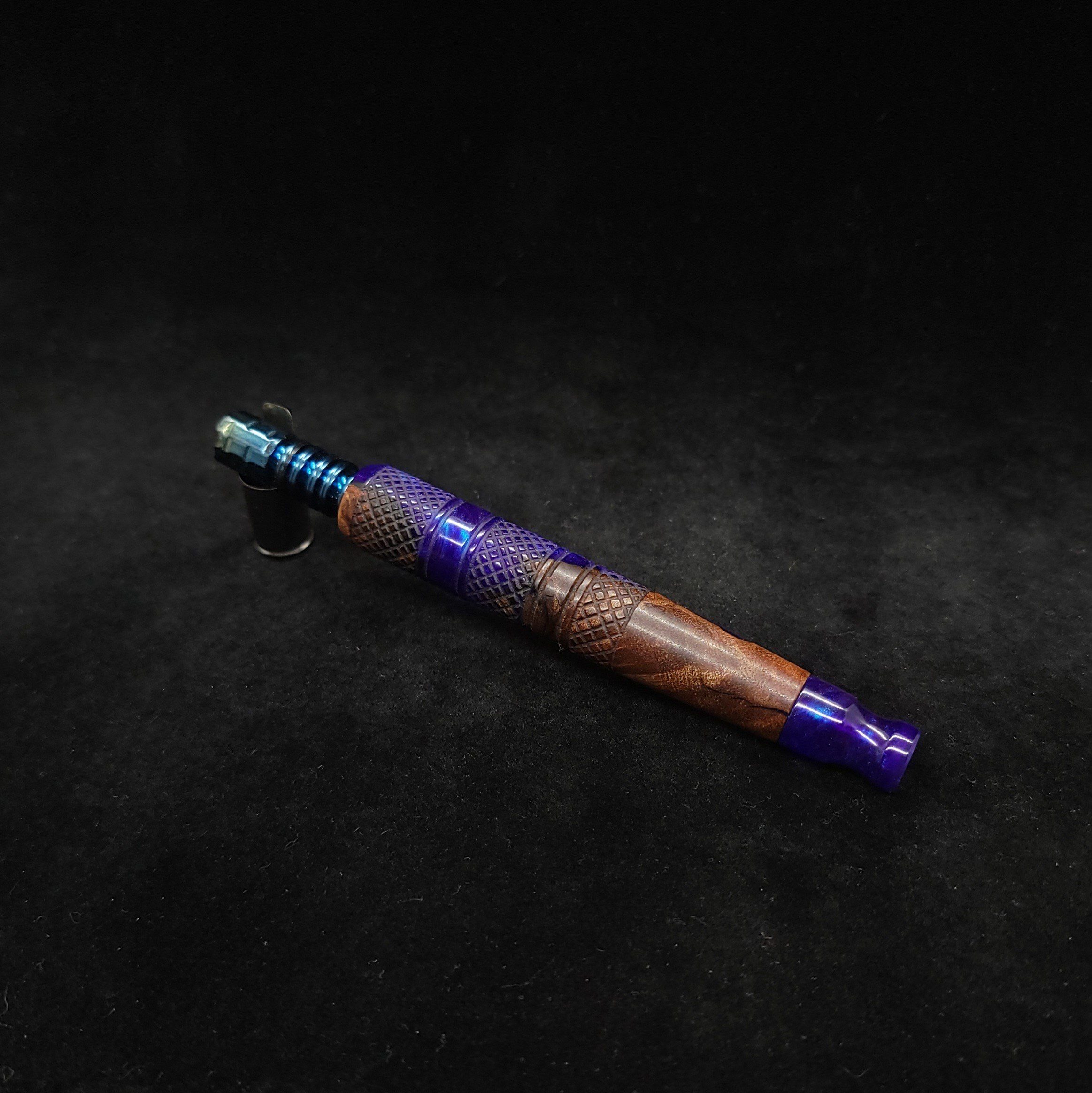 This image portrays High Class-Knurled XL Dynavap Stem/Walnut Burl Hybrid with Matching Mouthpiece by Dovetail Woodwork.