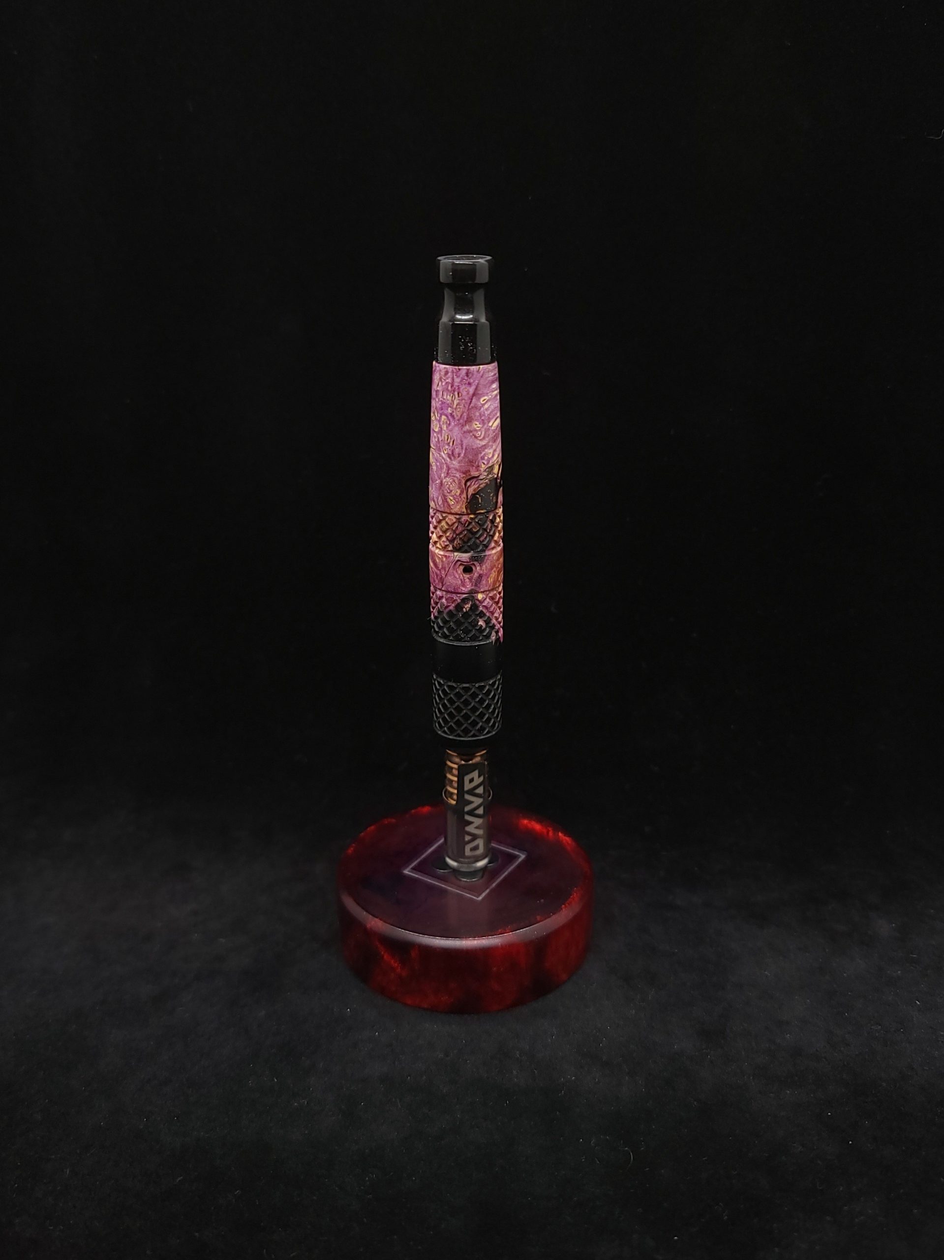 This image portrays High Class-Knurled XL Dynavap Stem/Metal Black Burl Hybrid + Matching Mouthpiece by Dovetail Woodwork.
