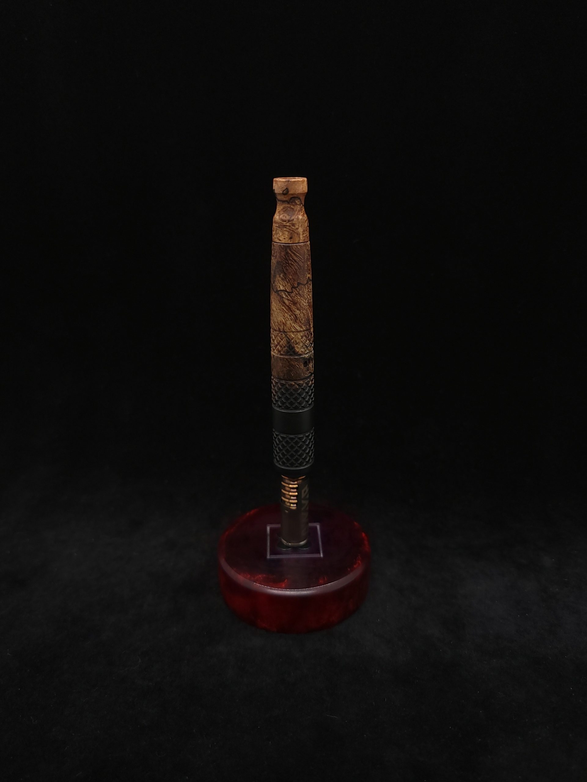 This image portrays High Class-Knurled XL Dynavap Stem/Matte Black Burl Hybrid + Matching M.P. by Dovetail Woodwork.