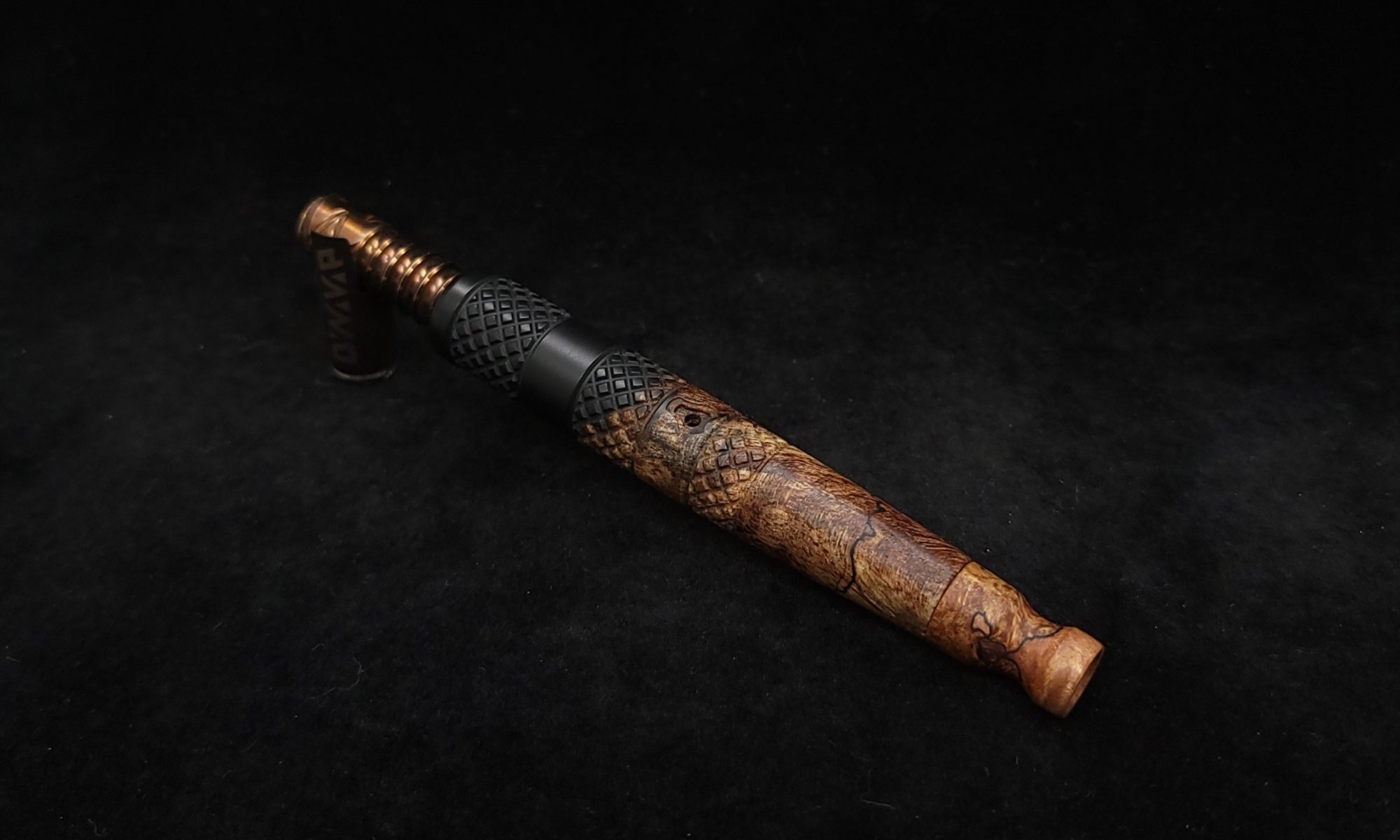 This image portrays High Class-Knurled XL Dynavap Stem/Matte Black Burl Hybrid + Matching M.P. by Dovetail Woodwork.