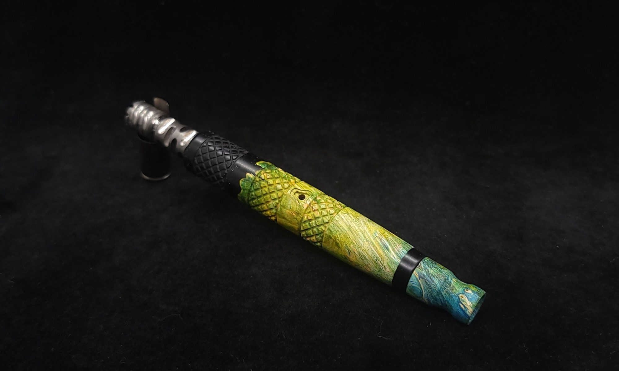 This image portrays High Class-Knurled XL Dynavap Stem/Metal Black Burl Hybrid + Matching Mouthpiece by Dovetail Woodwork.
