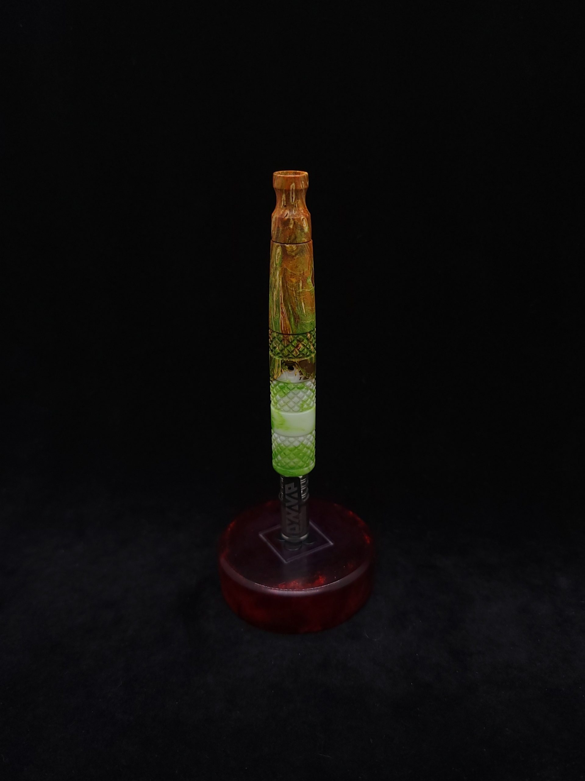 This image portrays High Class-Knurled XL Dynavap Stem/Luminescent Burl Hybrid + Matching M.P. by Dovetail Woodwork.