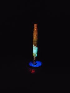 This image portrays High Class-Knurled XL Dynavap Stem/Luminescent Burl Hybrid + Matching M.P. by Dovetail Woodwork.