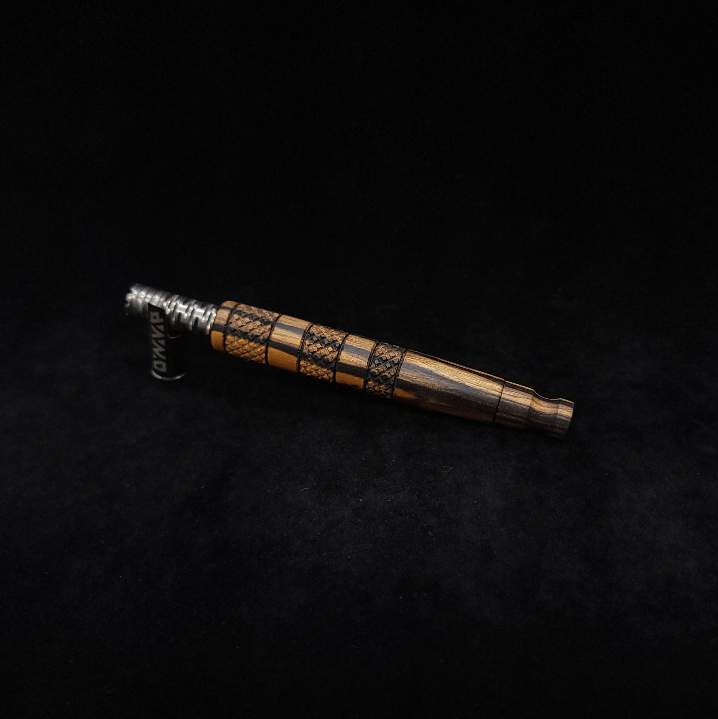 This image portrays High Class-Knurled XL Dynavap Stem/Black & White Ebony with Matching Mouthpiece by Dovetail Woodwork.