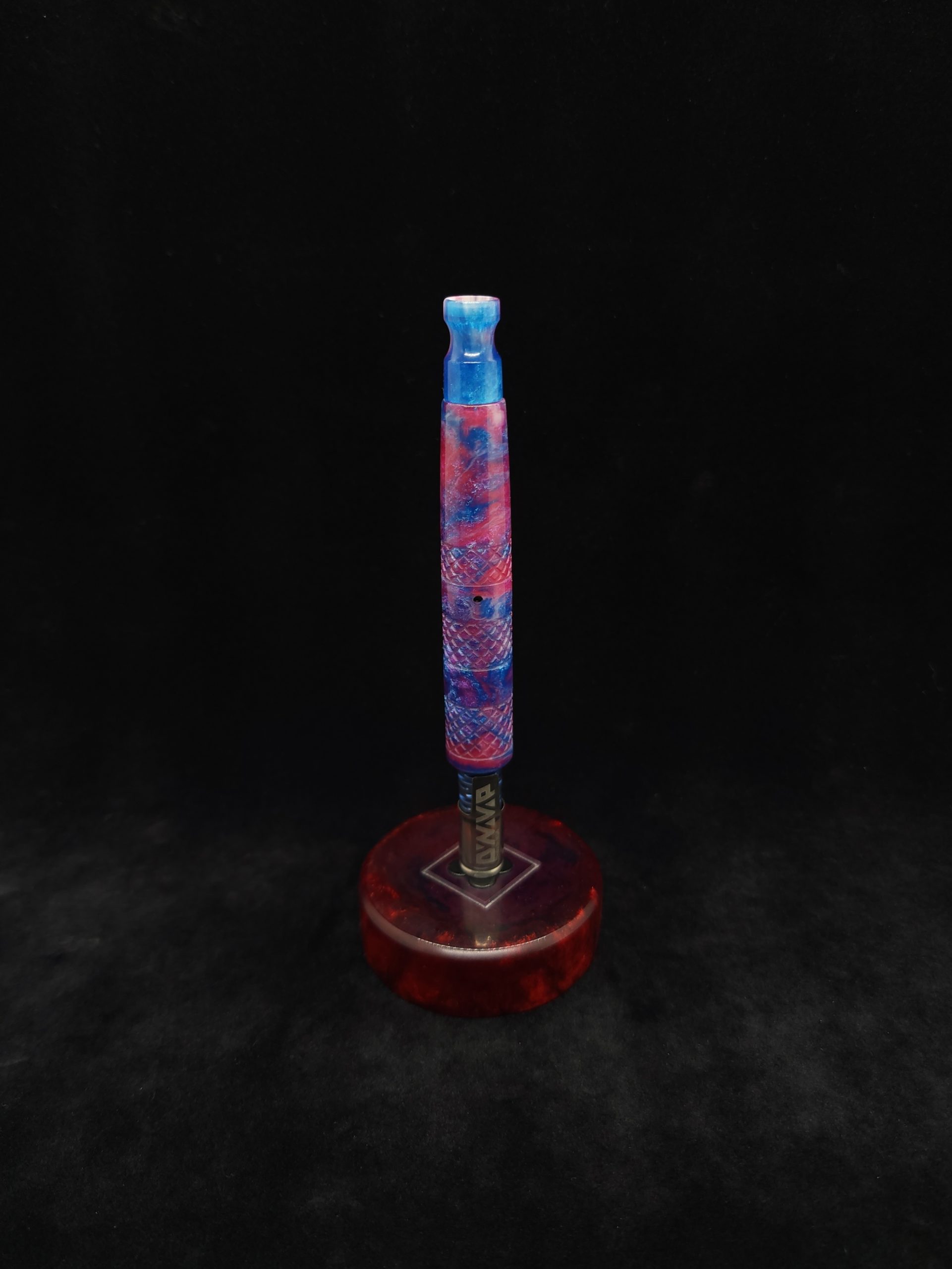 This image portrays High Class-Knurled XL Dynavap Stem/Luminescent Resin + Matching Mouthpiece by Dovetail Woodwork.