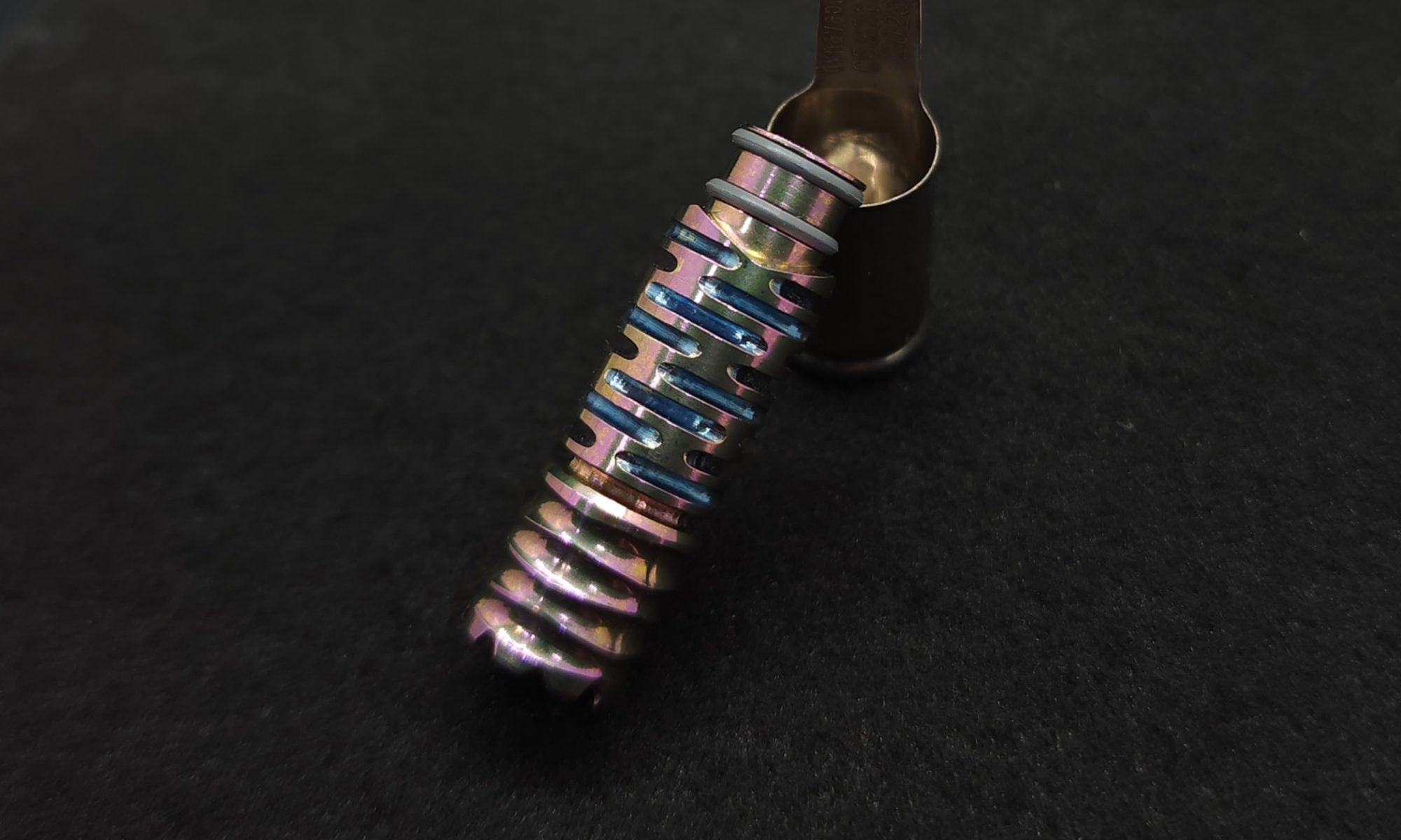 This image portrays Dynavap Vong Tip-Anodized(Rosium Color Theme) by Dovetail Woodwork.