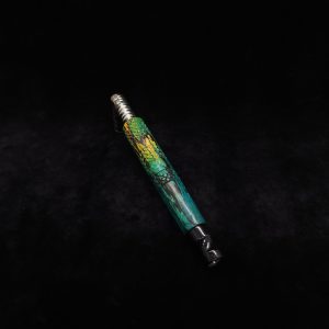 This image portrays High Class-Knurled XL Dynavap Stem/Spalted Tamarind/Blue to Green with Black Mouthpiece by Dovetail Woodwork.