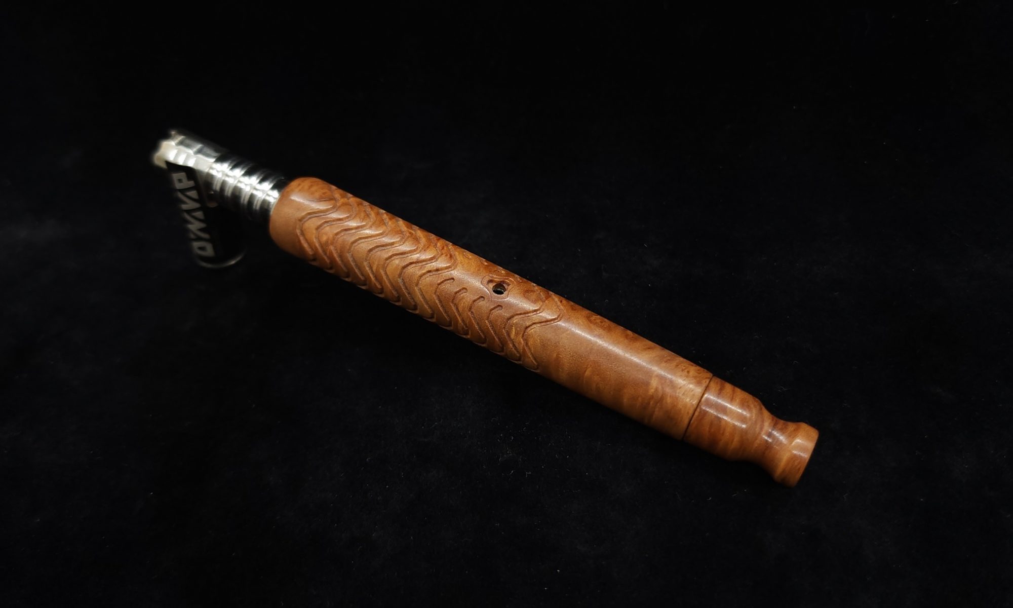 This image portrays Skeleton XL Dynavap Stem-Yellowbox Burl with Matching Mouthpiece by Dovetail Woodwork.