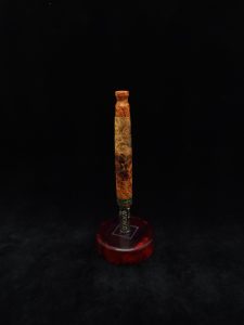 This image portrays Straight Taper XL Dynavap Stem + Amboyna Burl/Black Emerald Opal Inlay+M.P. by Dovetail Woodwork.