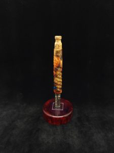 This image portrays Cosmic Burl Hybrid-Eclipse XL Dynavap Stem+Mouthpiece by Dovetail Woodwork.