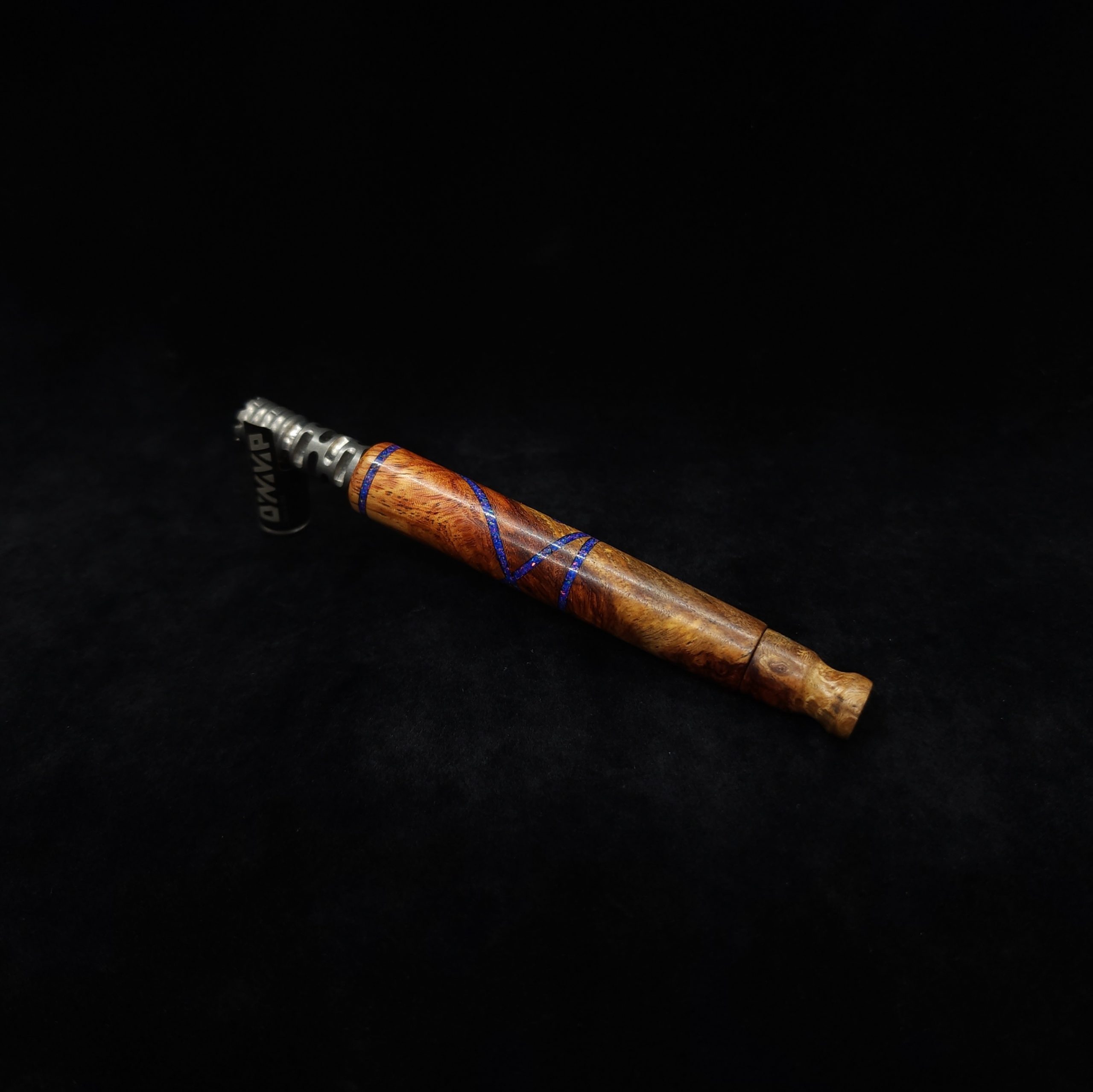 This image portrays Straight Taper XL Dynavap Stem + Amboyna Burl/Blue-Purple Opal Inlay+M.P. by Dovetail Woodwork.