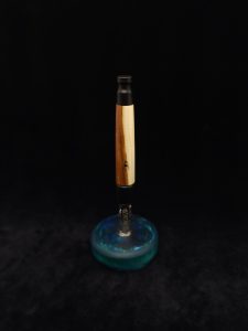 This image portrays Straight Taper XL Dynavap Stem + Red Bud Wood/Ebony Hybrid + M.P. by Dovetail Woodwork.