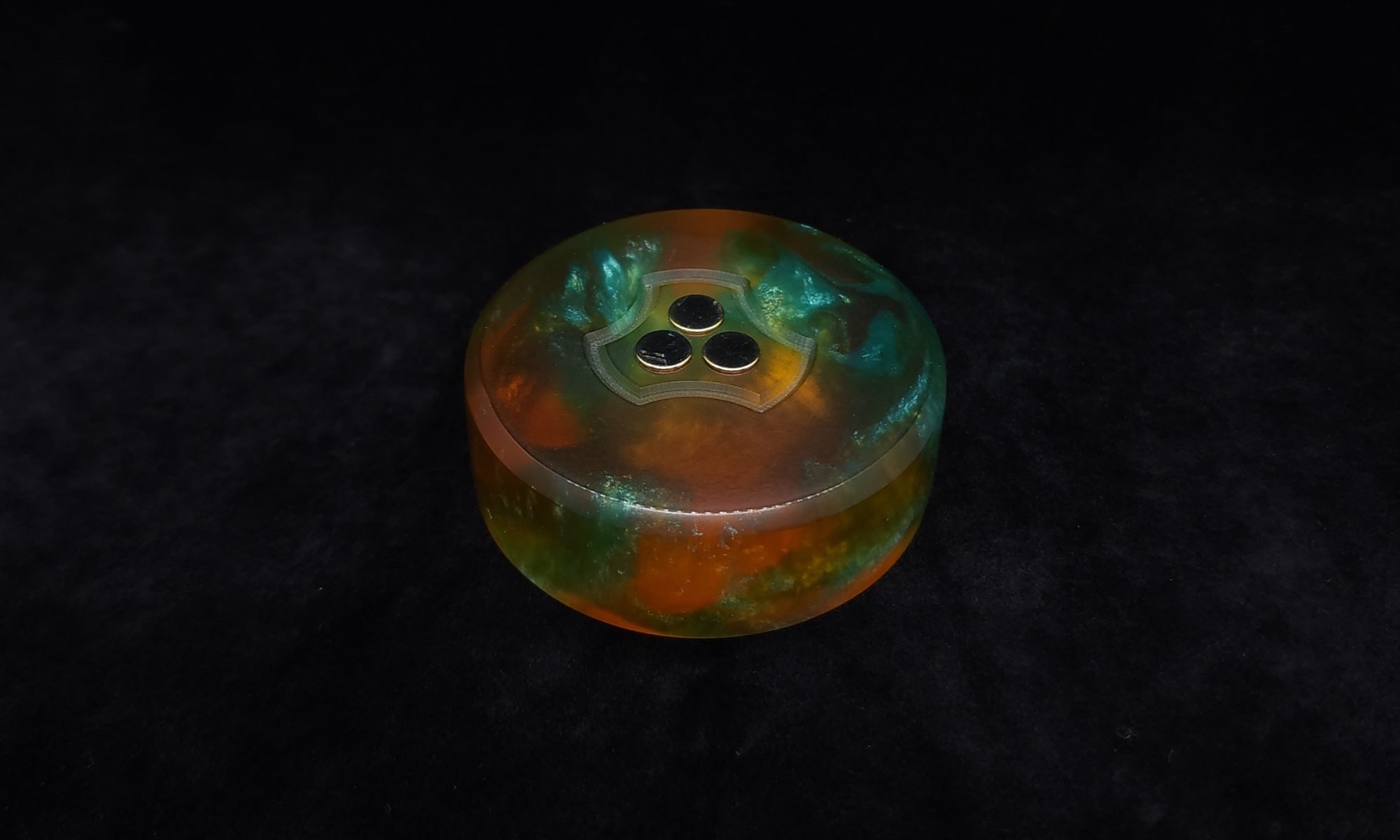 This image portrays DynaPuck-Cosmic Series-Luminescent-Dynavap Stem Display by Dovetail Woodwork.