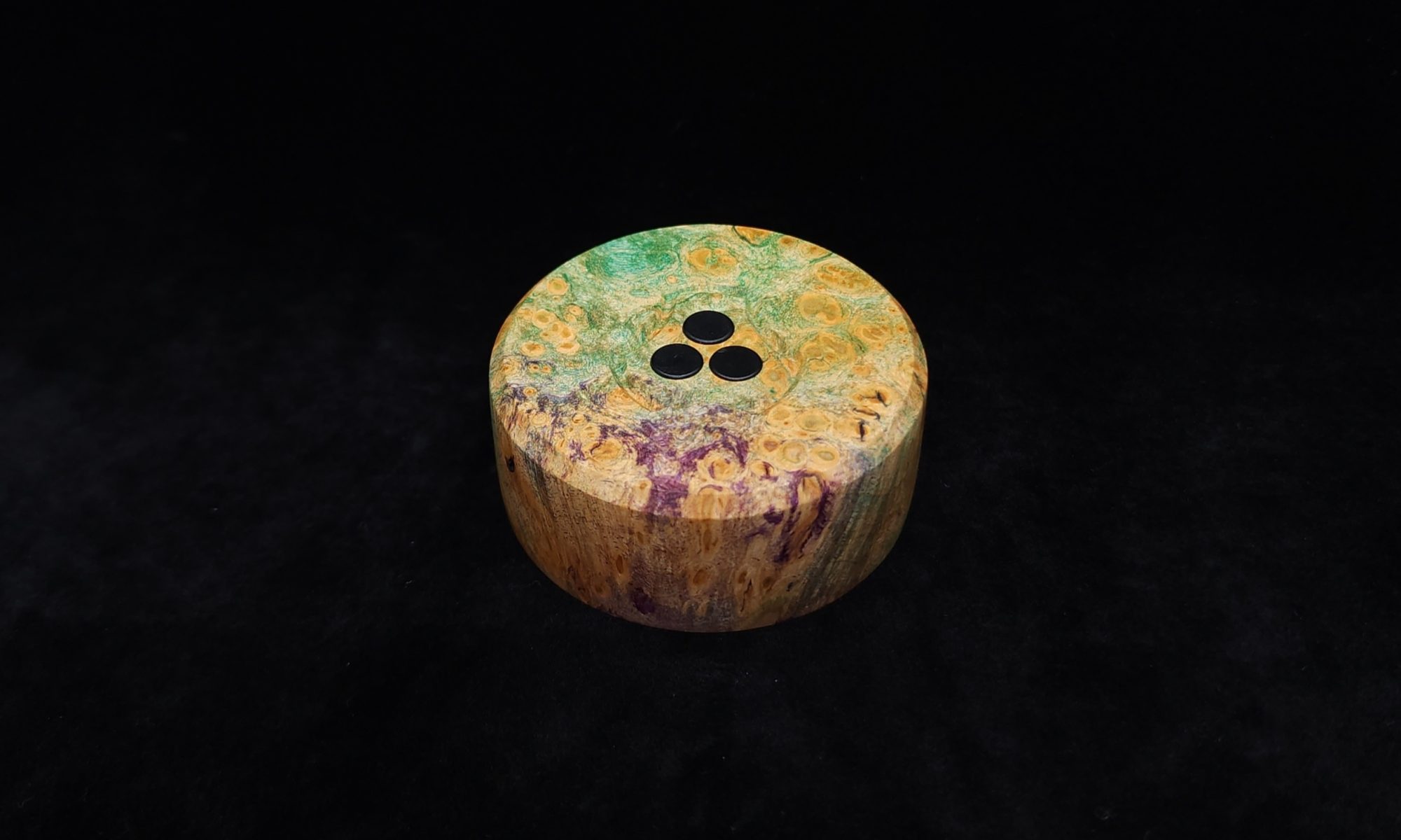 This image portrays DynaPuck-Madrone Burl/Color Fade-Dynavap Stem Display by Dovetail Woodwork.