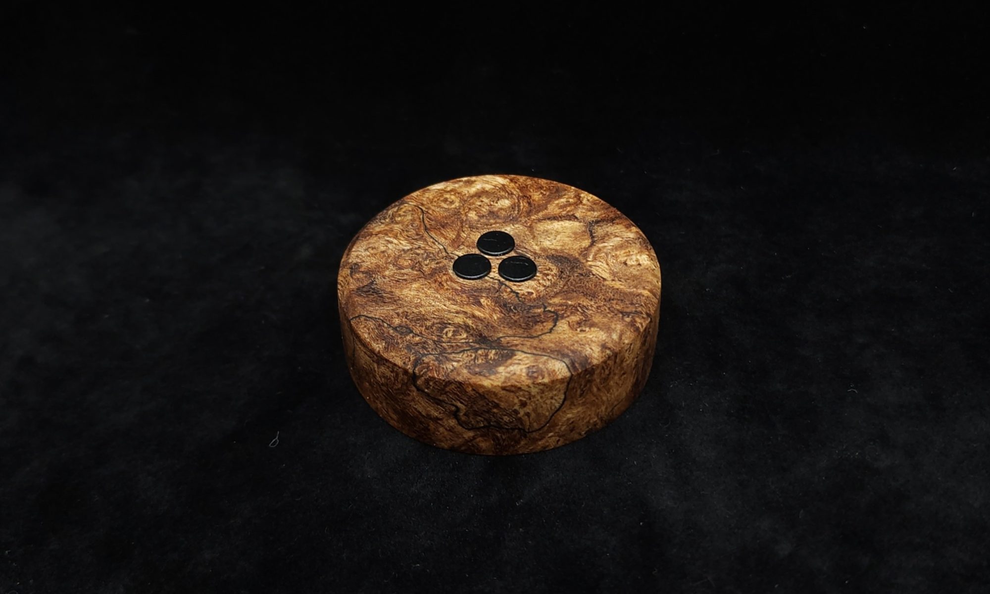 This image portrays DynaPuck-Spalted Maple Burl Wood-Dynavap Stem Display by Dovetail Woodwork.